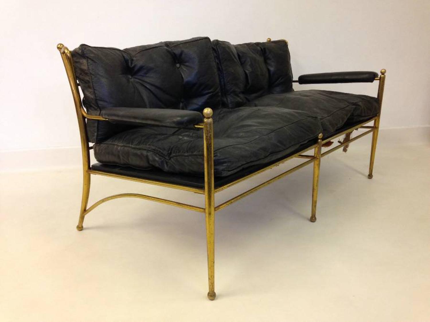 Brass framed and leather sofa