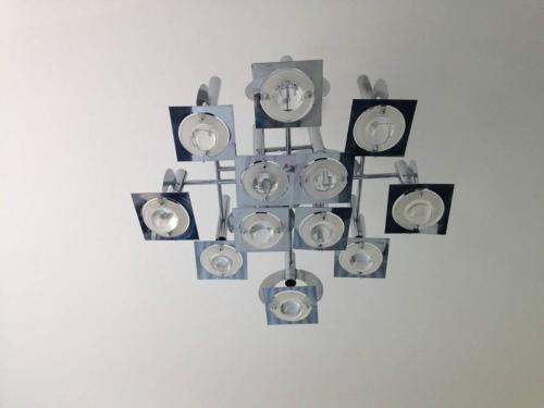 Italian chrome and convex glass chandelier