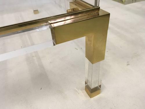 Lucite and brass sliding coffee table