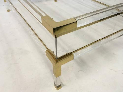 Lucite and brass sliding coffee table