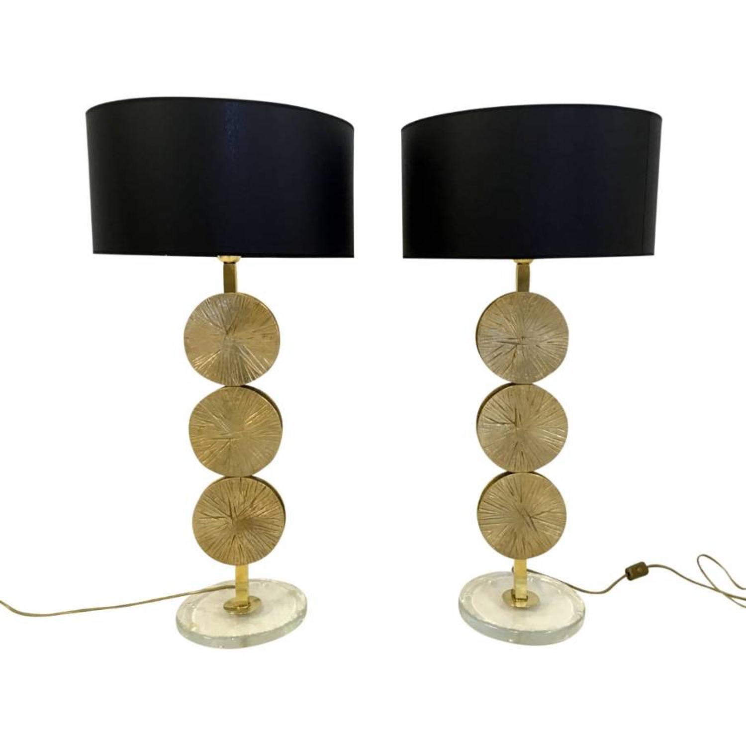 A pair of brass and murano glass table lamps