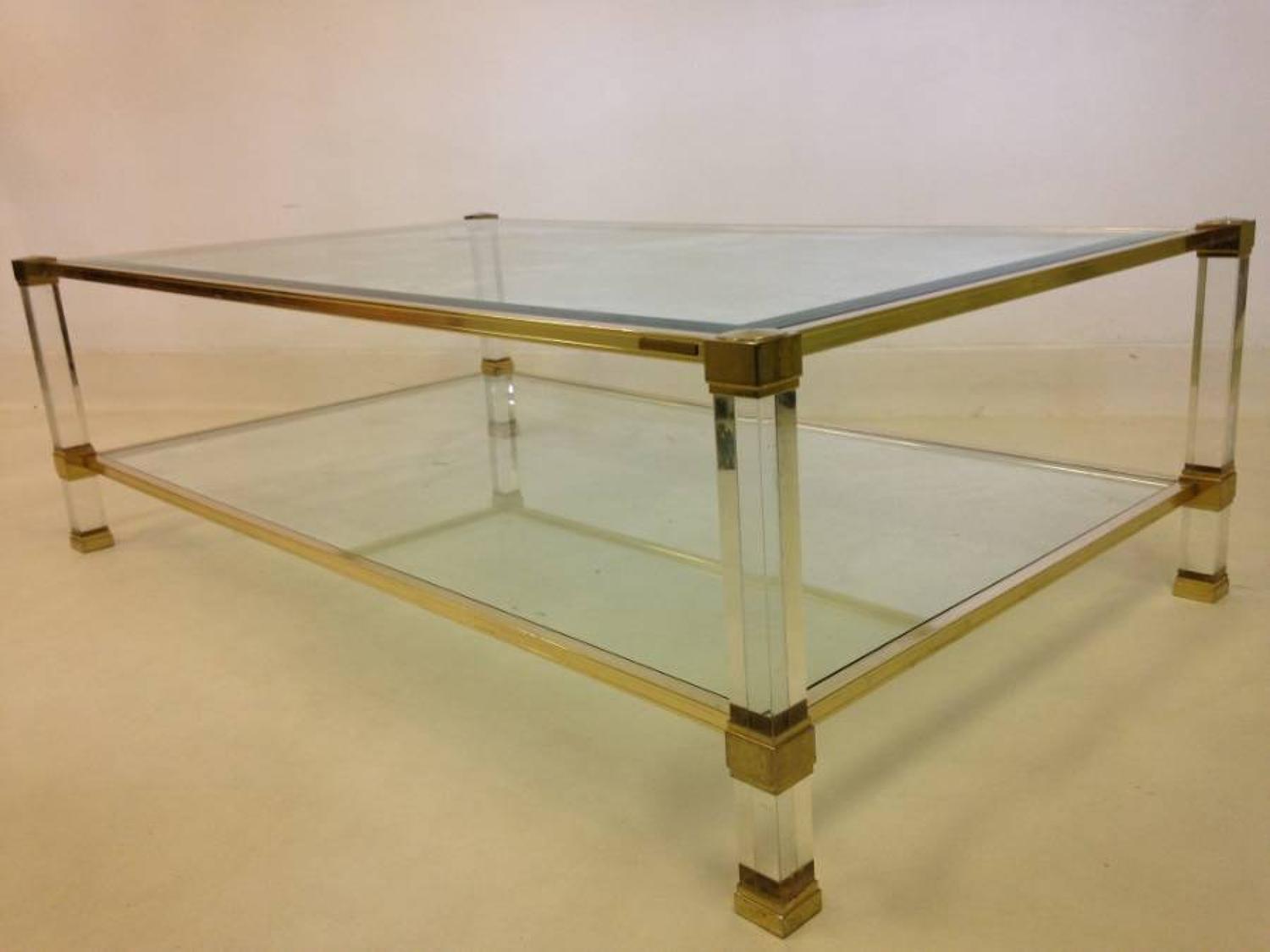 Lucite and brass coffee table by Pierre Vandel
