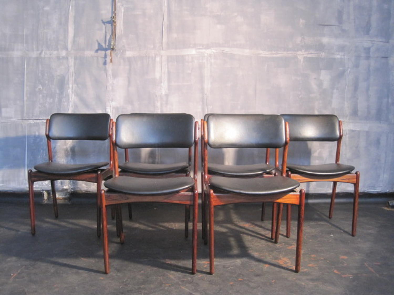 A set of six rosewood dinig chairs by Erik Buck