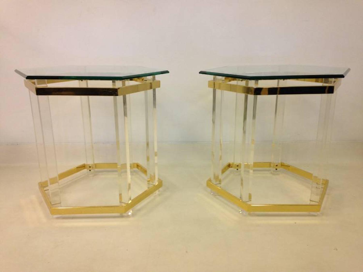 A pair of lucite side tables