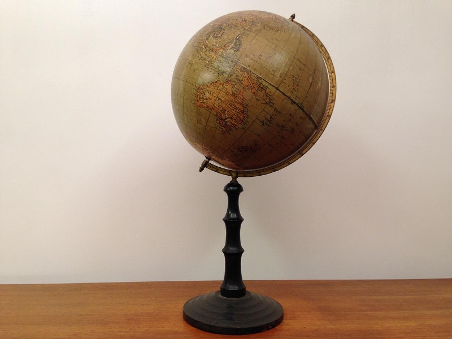 Vintage  globe on turned ebonised stand