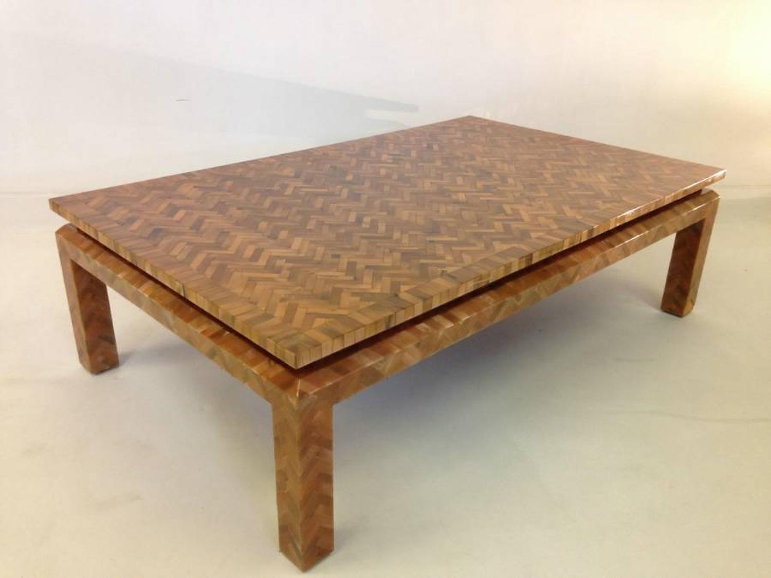 Simulated amber herringbone coffee table