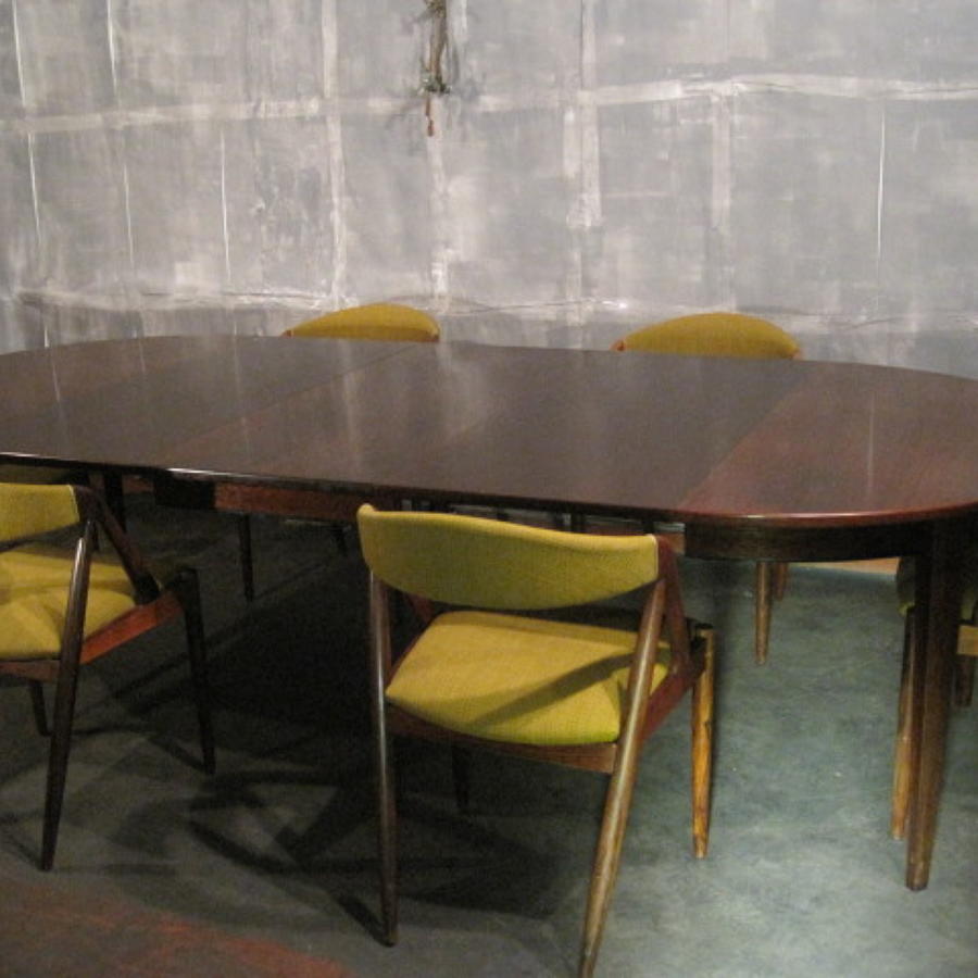 Large rosewood dining table by Omann Jun