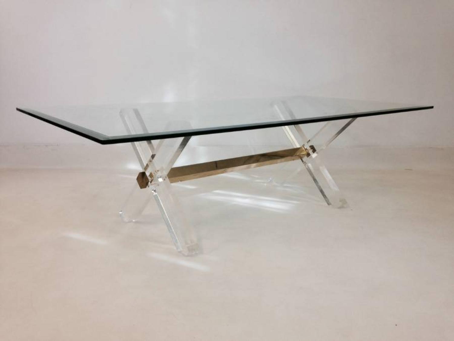 Lucite and brass X frame coffee table