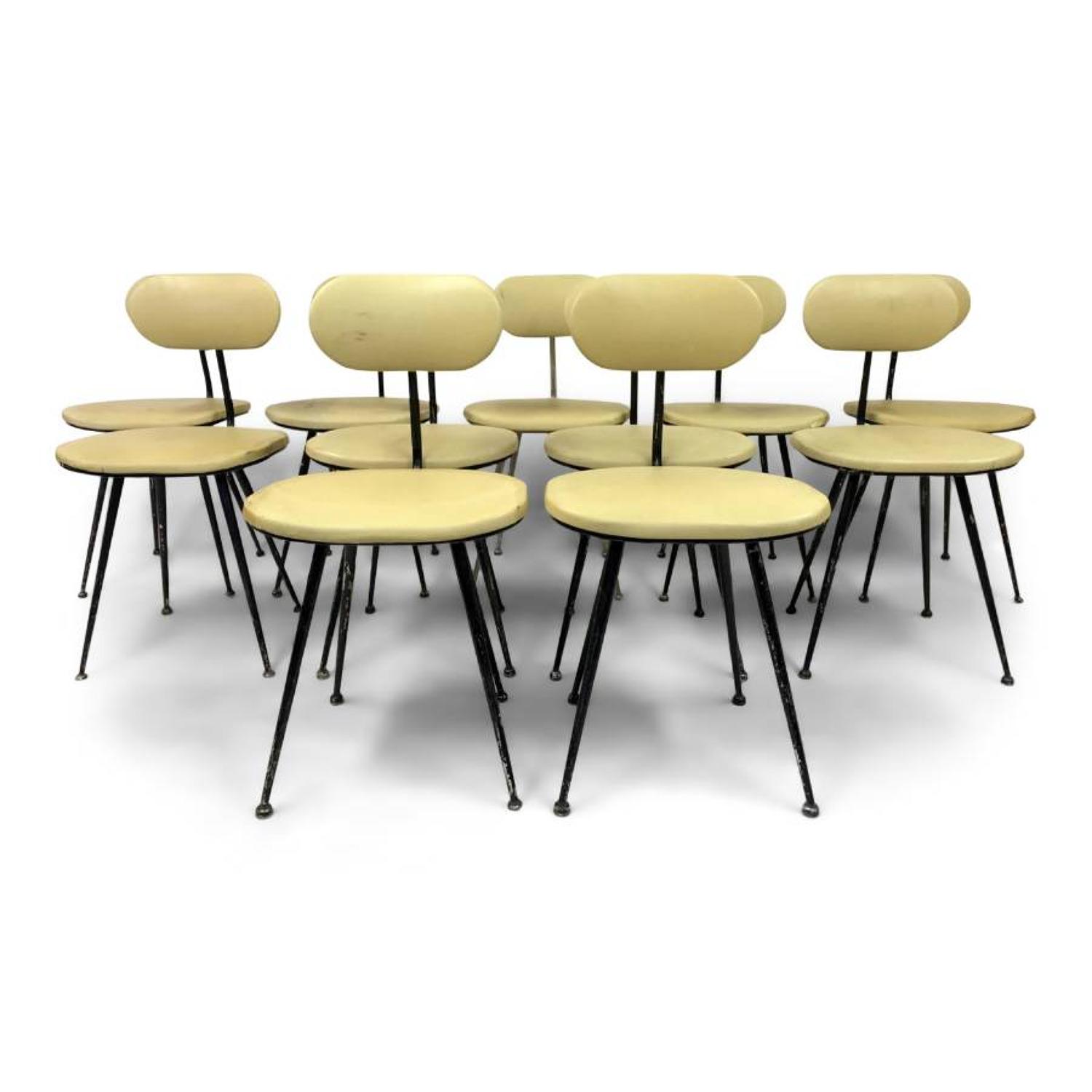 A set of eleven industrial dining chairs
