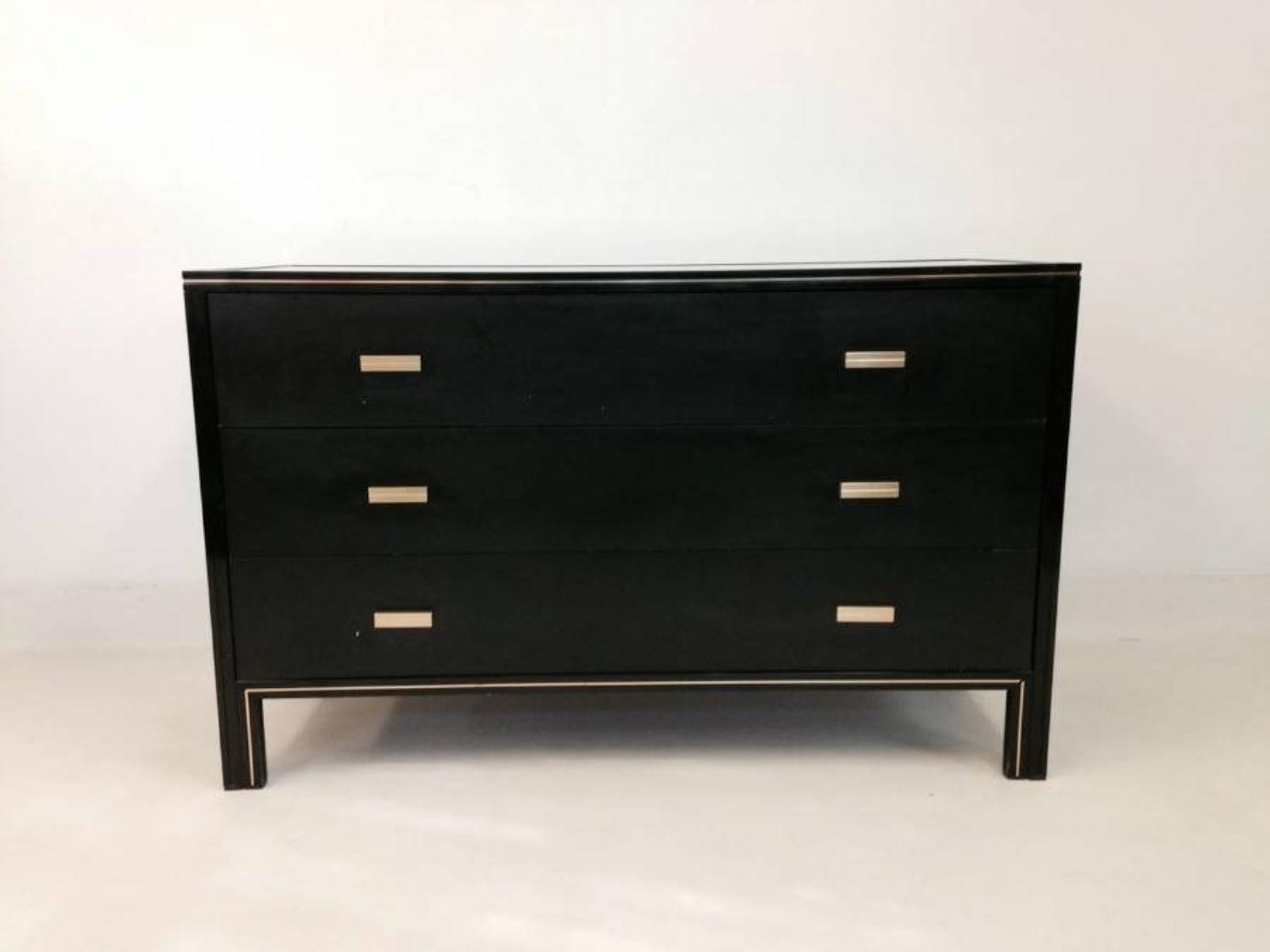 Black lacquered and brass chest by Pierre Vandel