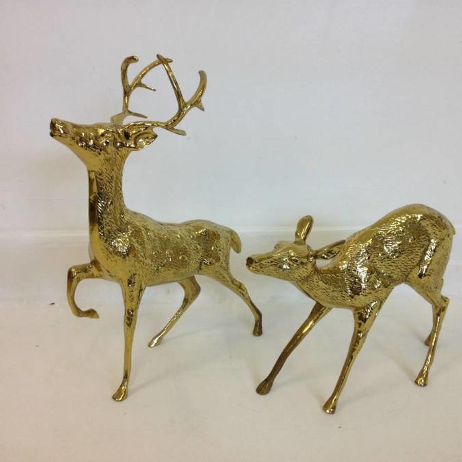 A pair of vintage brass reindeers