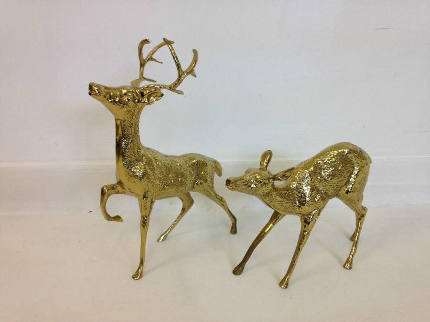 A pair of vintage brass reindeers
