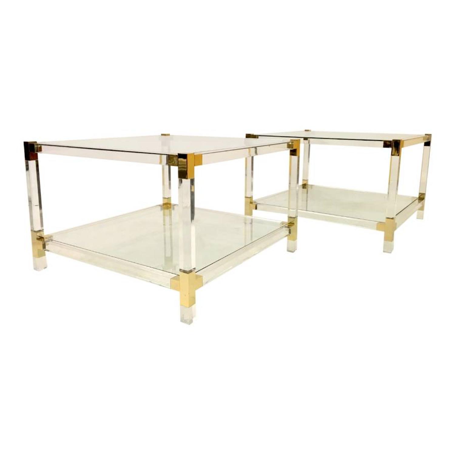 A pair of two tier lucite side tables