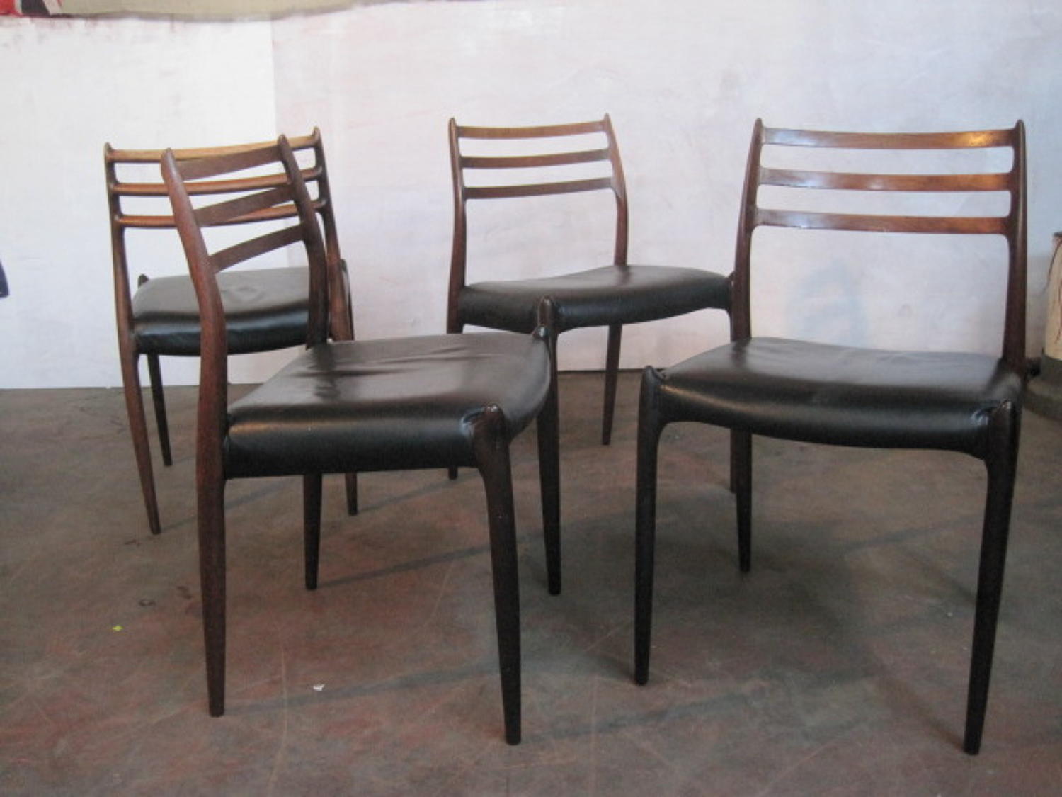 Four rosewood dining chairs by N.O Moller model 78