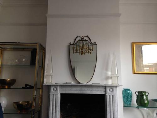 Italian brass shield mirror