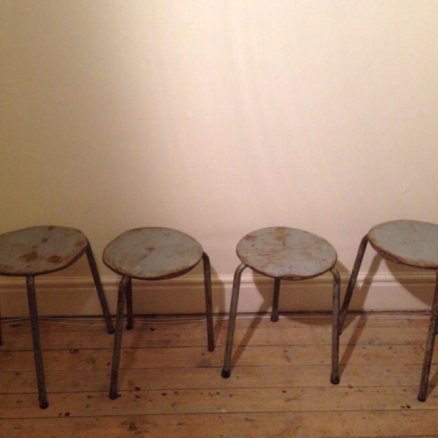 Vintage three legged metal stacking stools