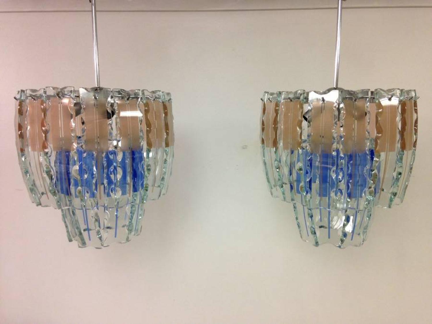 A pair of blue and pink Murano glass chandeliers