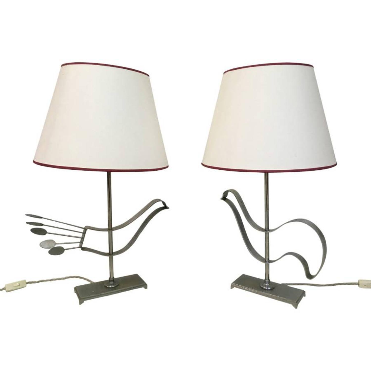 A pair of French steel abstract bird lamps