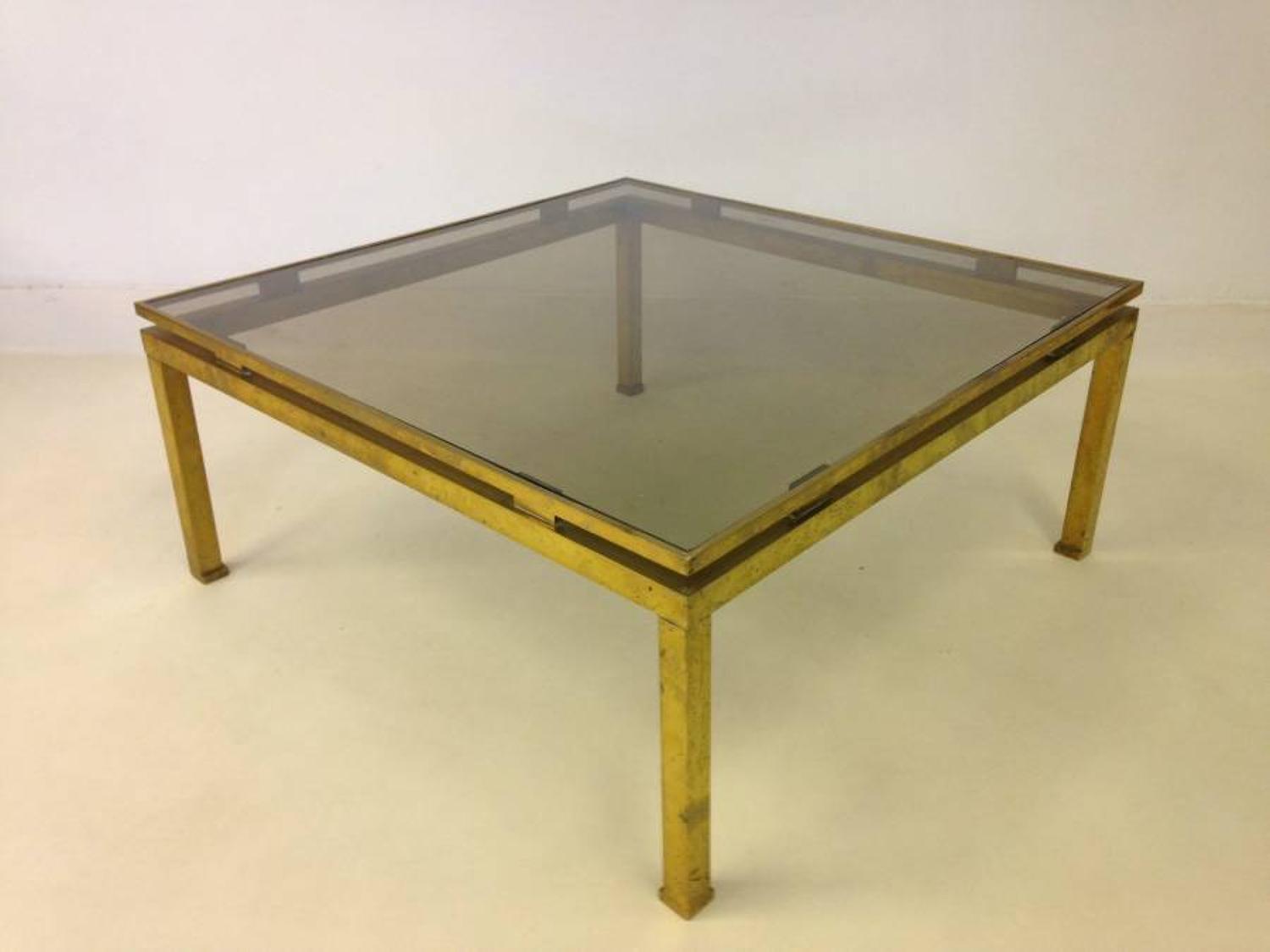 Brass coffee table by Guy Lefevre