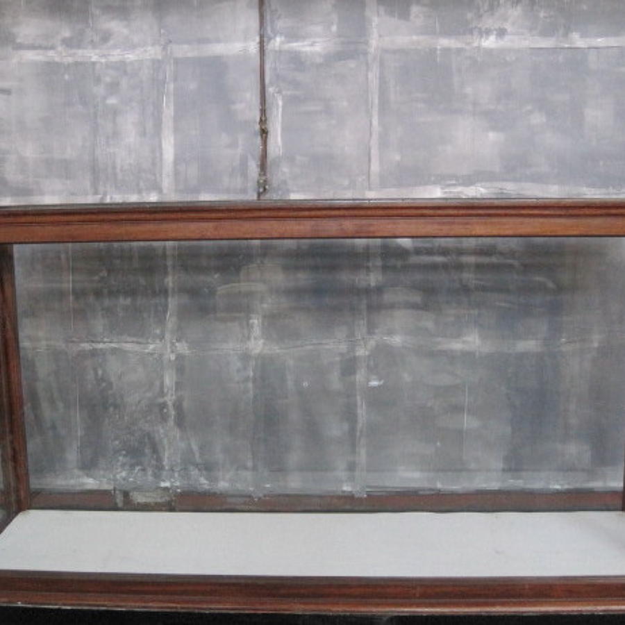 A pair of museum cabinets