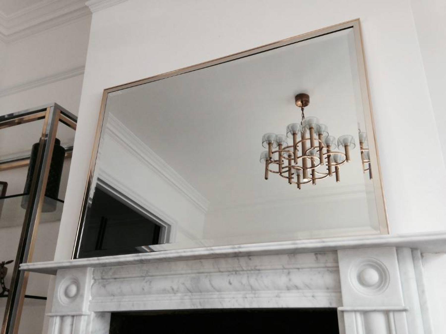 Brass and chrome framed mirror