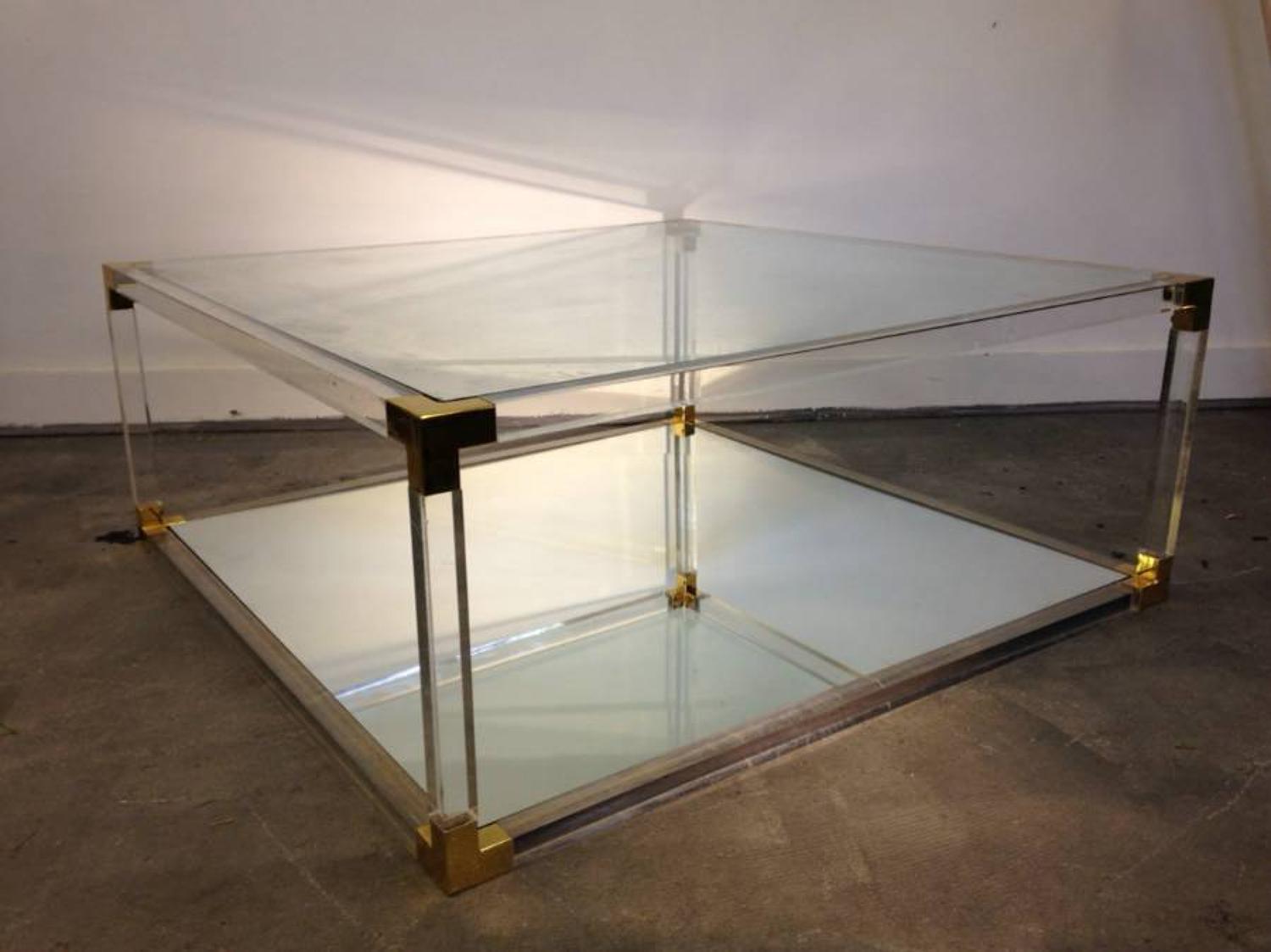 French lucite and brass coffee table