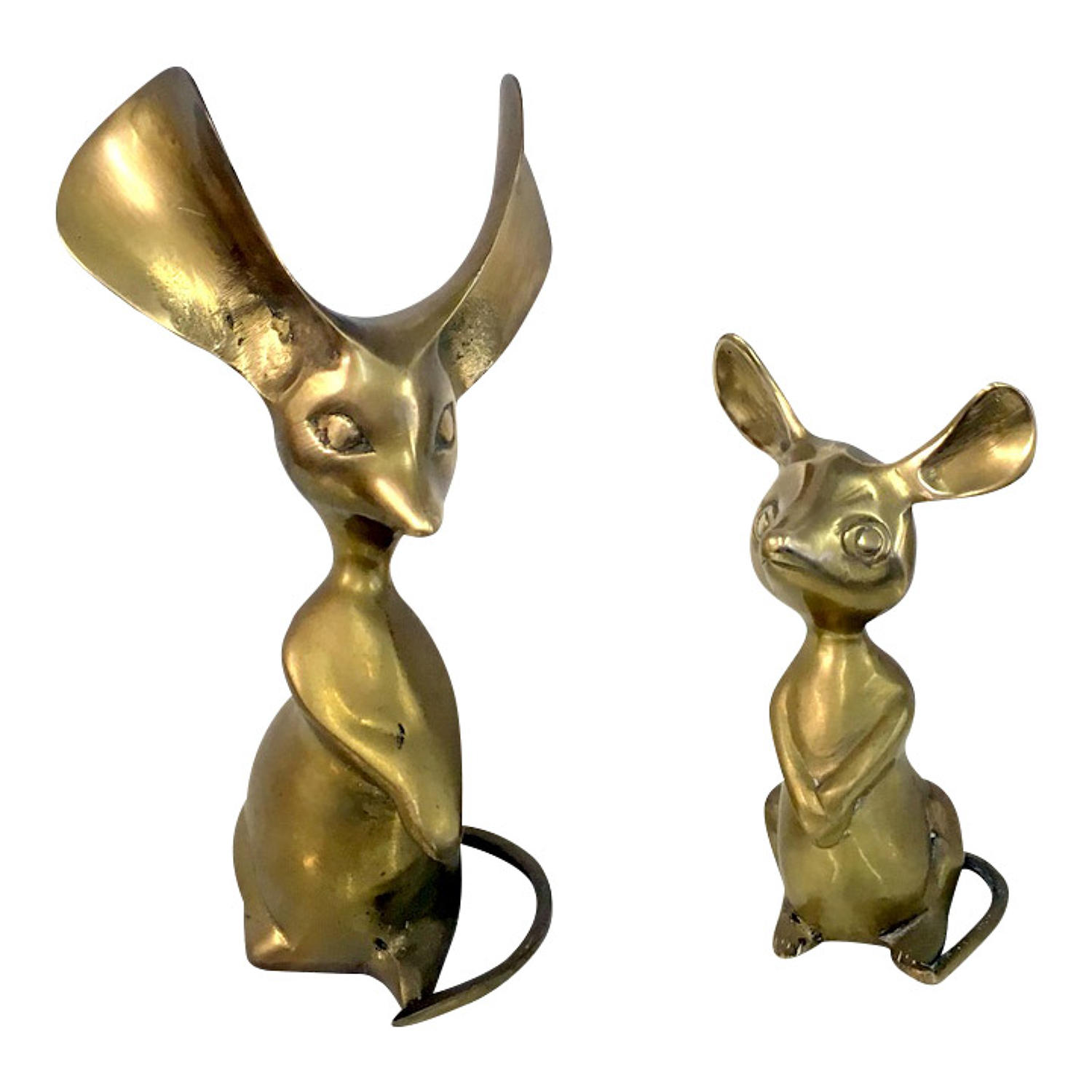 A pair of stylized mice figures
