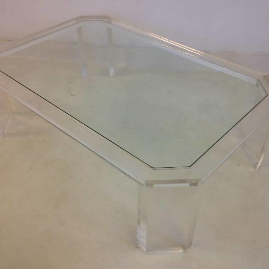 Canted edge lucite coffee table