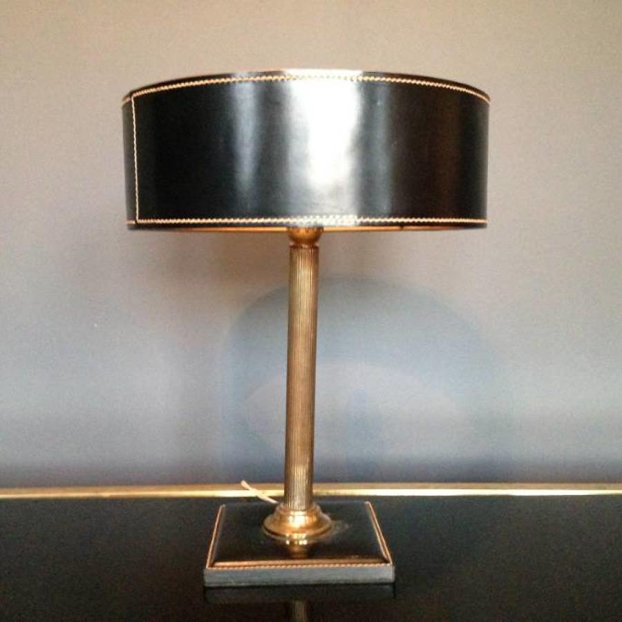 Stitched leather and brass lamp by Jacques Adnet