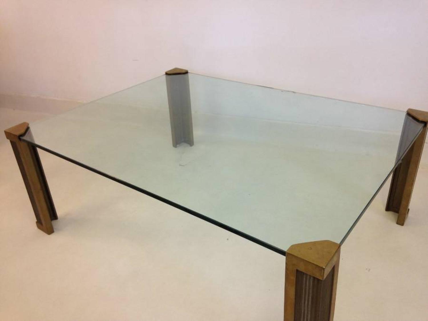 Brass and glass coffee table by Peter Ghyczy