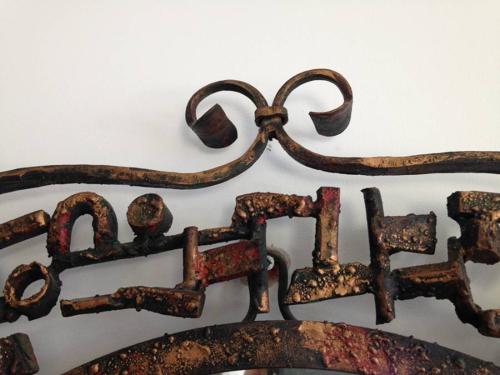 Italian gilded iron mirror Marsura Salvino