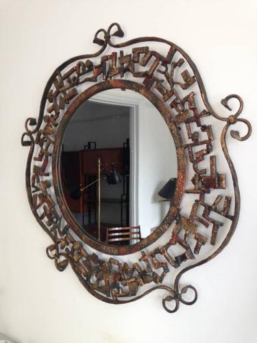 Italian gilded iron mirror Marsura Salvino