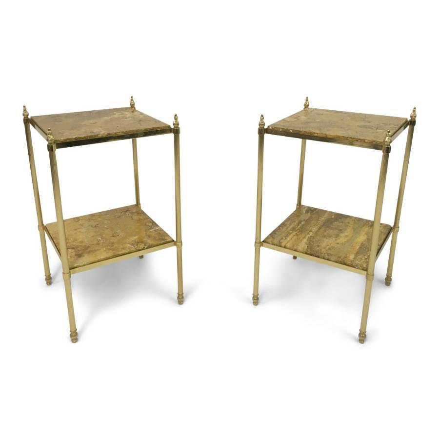 A pair of French brass and stone side tables