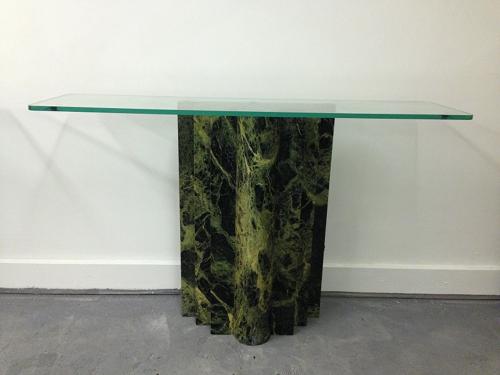 A pair of marble and glass console tables