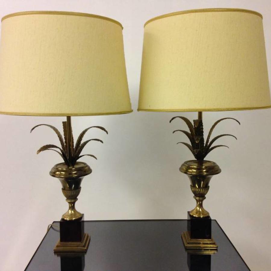 A pair of  brass and resin pineapple frond lamps