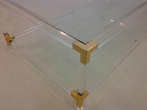 Lucite and brass coffee table