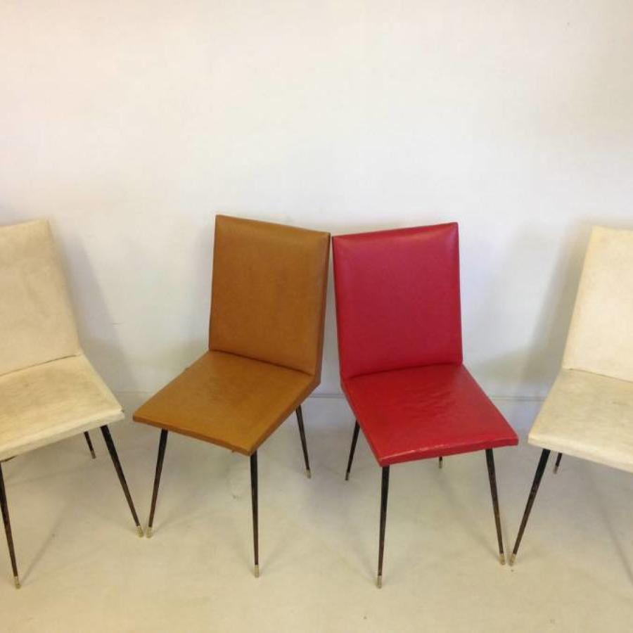 A set of four French steel and brass chairs