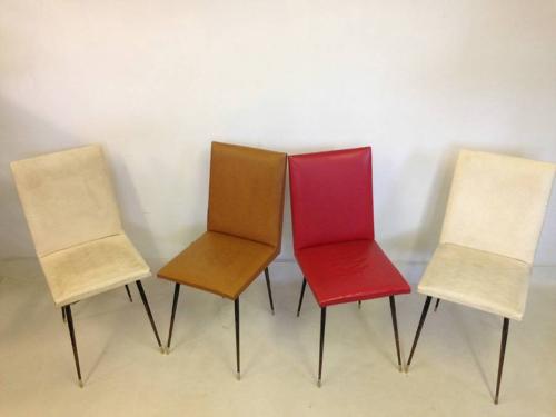 A set of four French steel and brass chairs