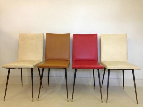 A set of four French steel and brass chairs