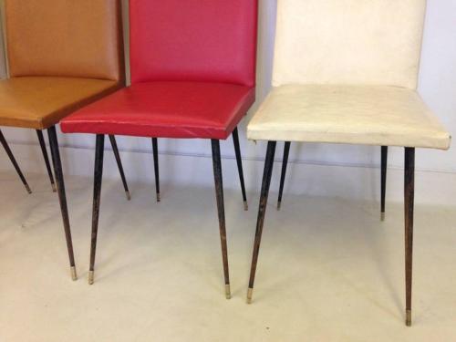 A set of four French steel and brass chairs