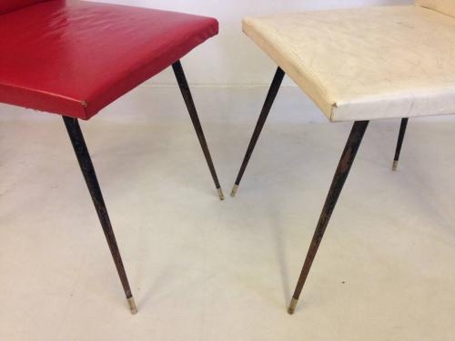 A set of four French steel and brass chairs