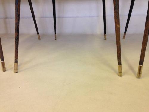 A set of four French steel and brass chairs