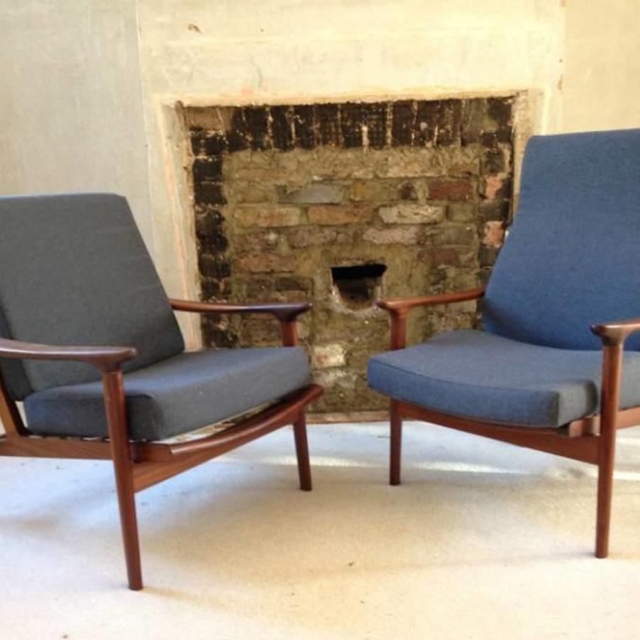 A pair of Guy Rogers armchairs