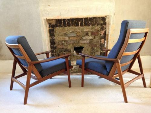 A pair of Guy Rogers armchairs