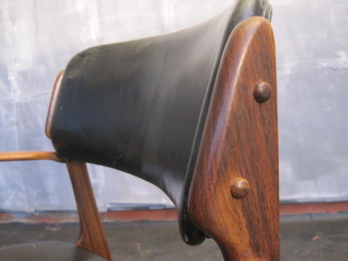 Rosewood and leather armchair by Erik Buck