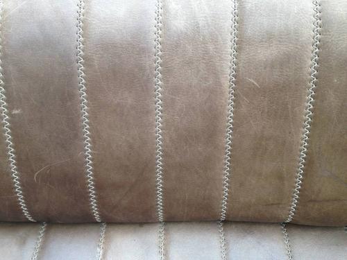 Leather sofa and two armchairs by De Sede