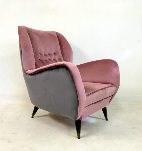 A pair of velvet upholstered Italian armchairs