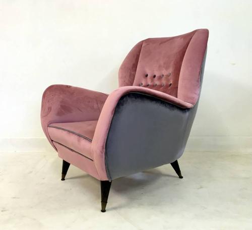 A pair of velvet upholstered Italian armchairs