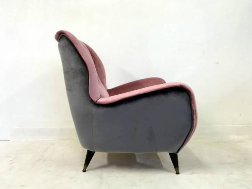 A pair of velvet upholstered Italian armchairs