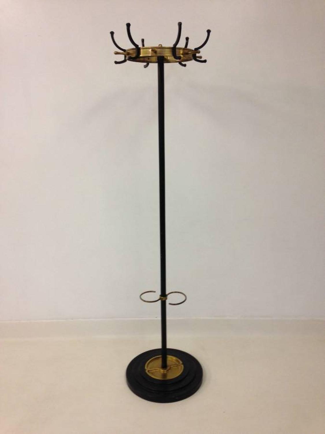 Iron and brass coatstand by Jacques Adnet
